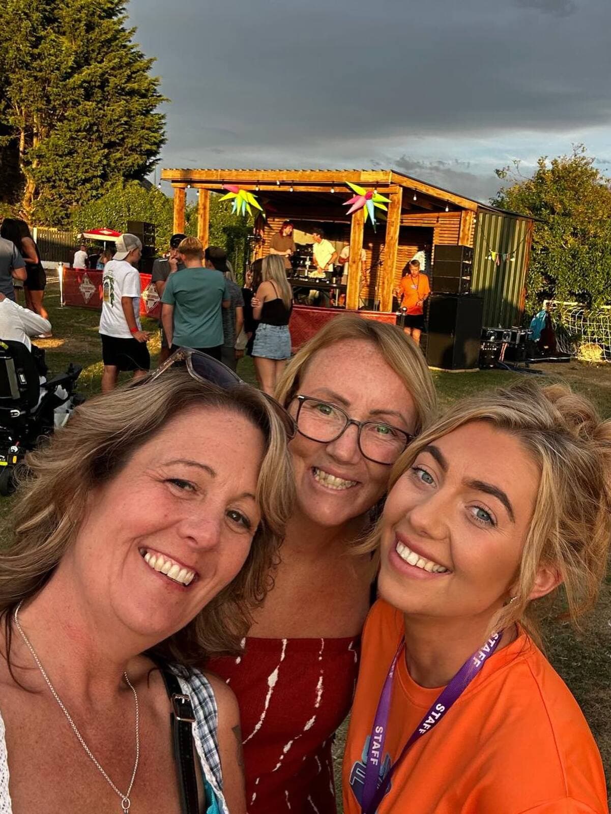 Dusk falling over the lit stage at The Comfortable Gill Garden Party, Glazebury